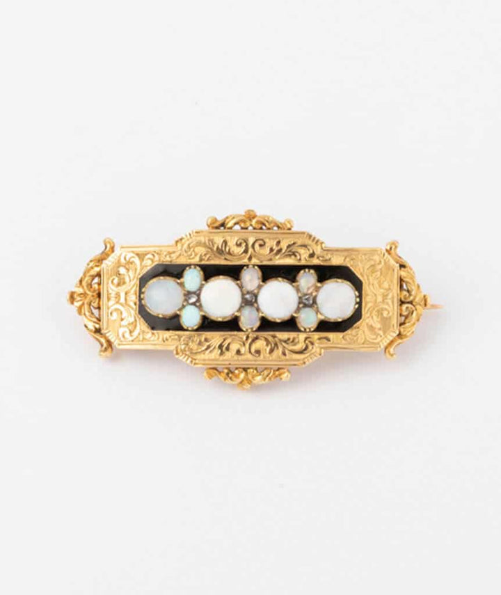 Broche porte-montre avec opales